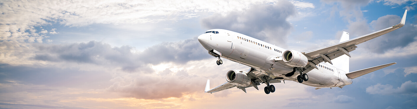 modern airliner against a cloudy sky