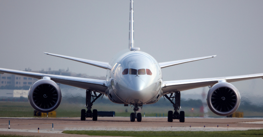 A front shot of an airplane getting ready for take off.